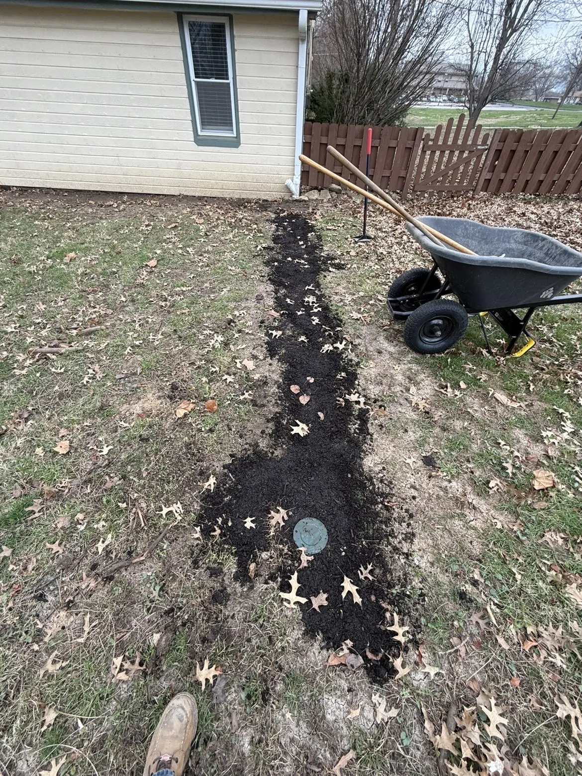 Completed pop-up emitter in residential yard