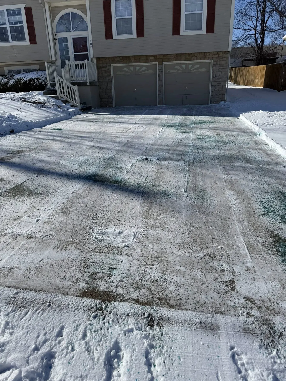 Driveway cleared and treated with ice melt